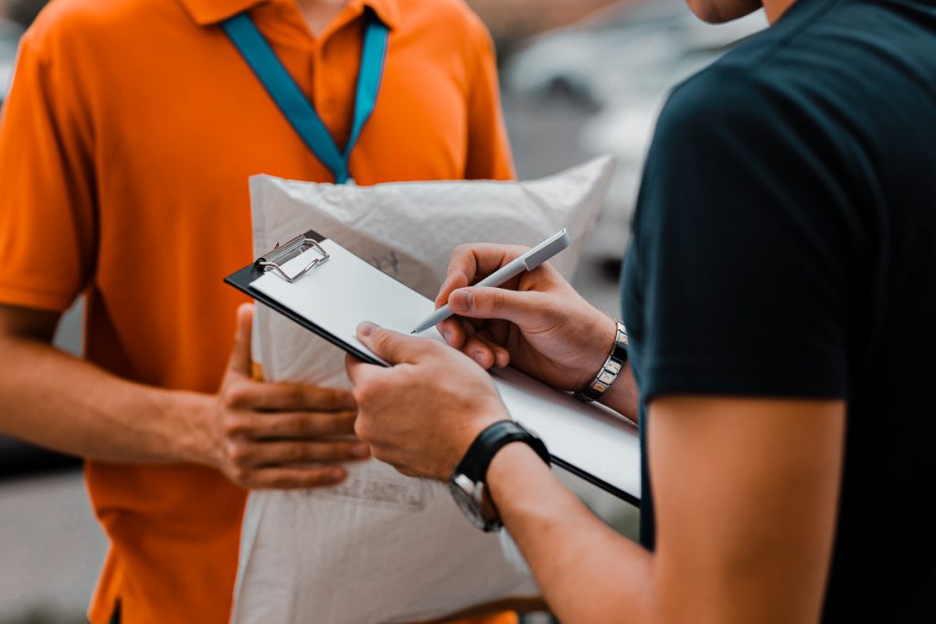 Courier delivering a high-end product with white-glove service.