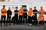 The Selena Courier Service team of couriers and coordinators in front of Selena vehicles in London