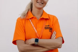 Selena Courier team member in branded uniform