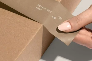 Courier delivering a personalised parcel in central London.