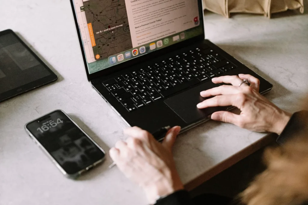 Booking a same-day courier on a laptop in London