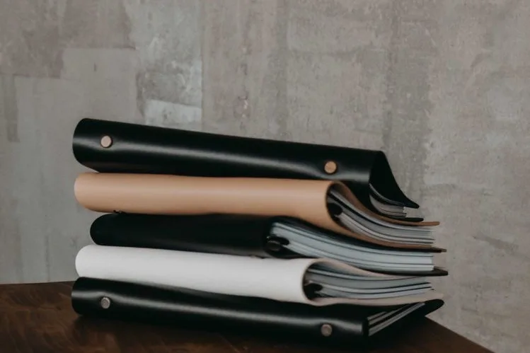 Courier delivering legal documents to a London office.