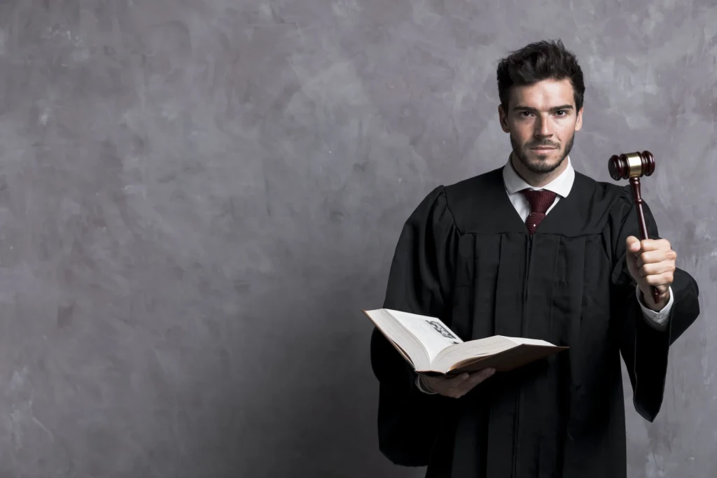 Legal professional holding a book in chambers