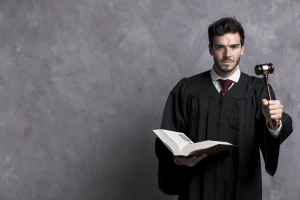 Legal professional holding a book in chambers