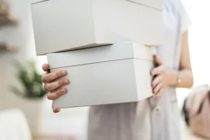 Courier delivering logistics items.