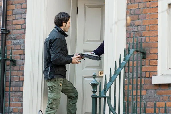 Selena Courier delivering a same-day business parcel in London.
