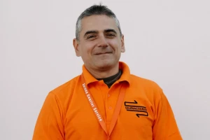 A Selena Courier Service employee with a disability, demonstrating inclusivity in the workplace.