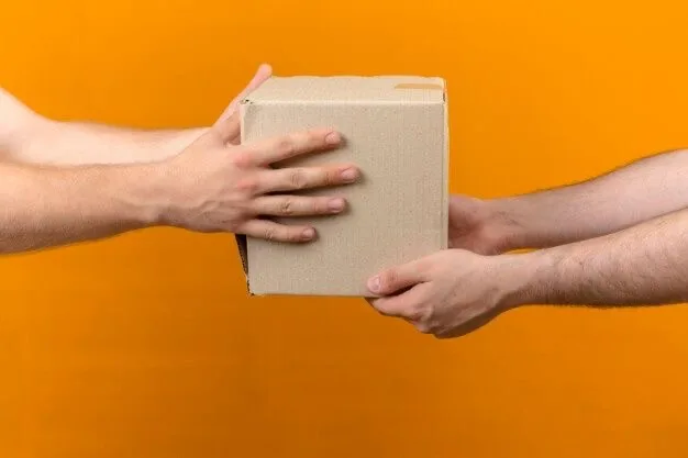 Courier delivering goods for a small business in London.