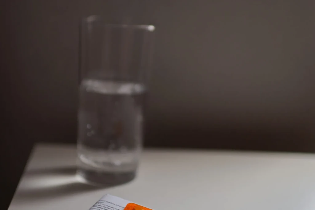 Courier delivering prescriptions to a home