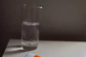 Courier delivering prescriptions to a home