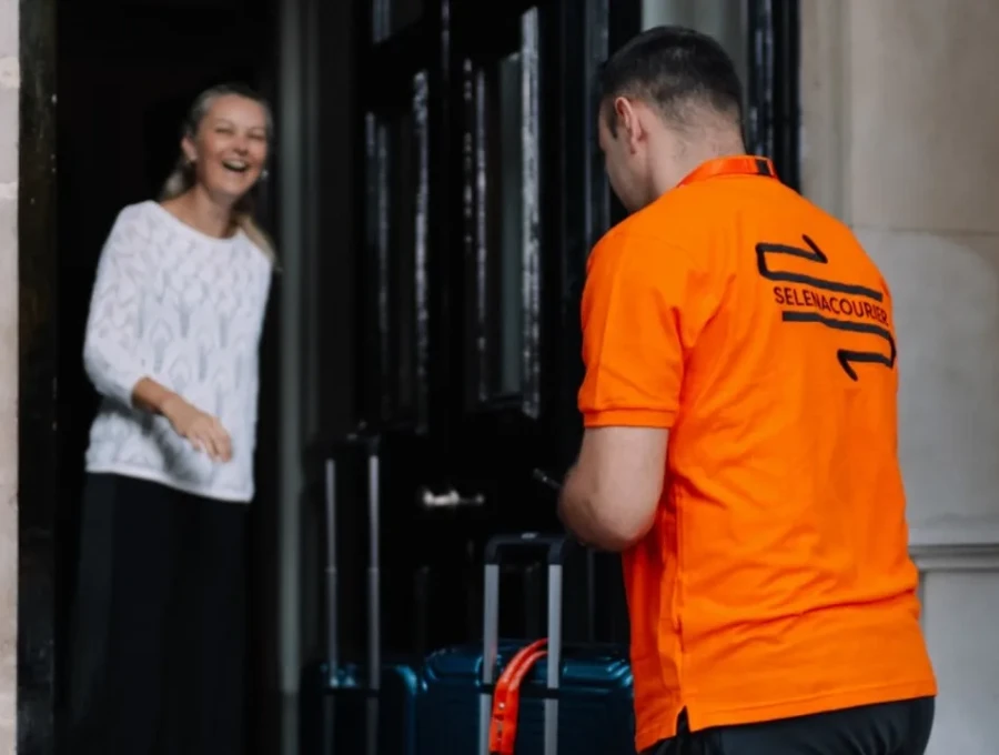 Selena courier collecting from a client at their premises