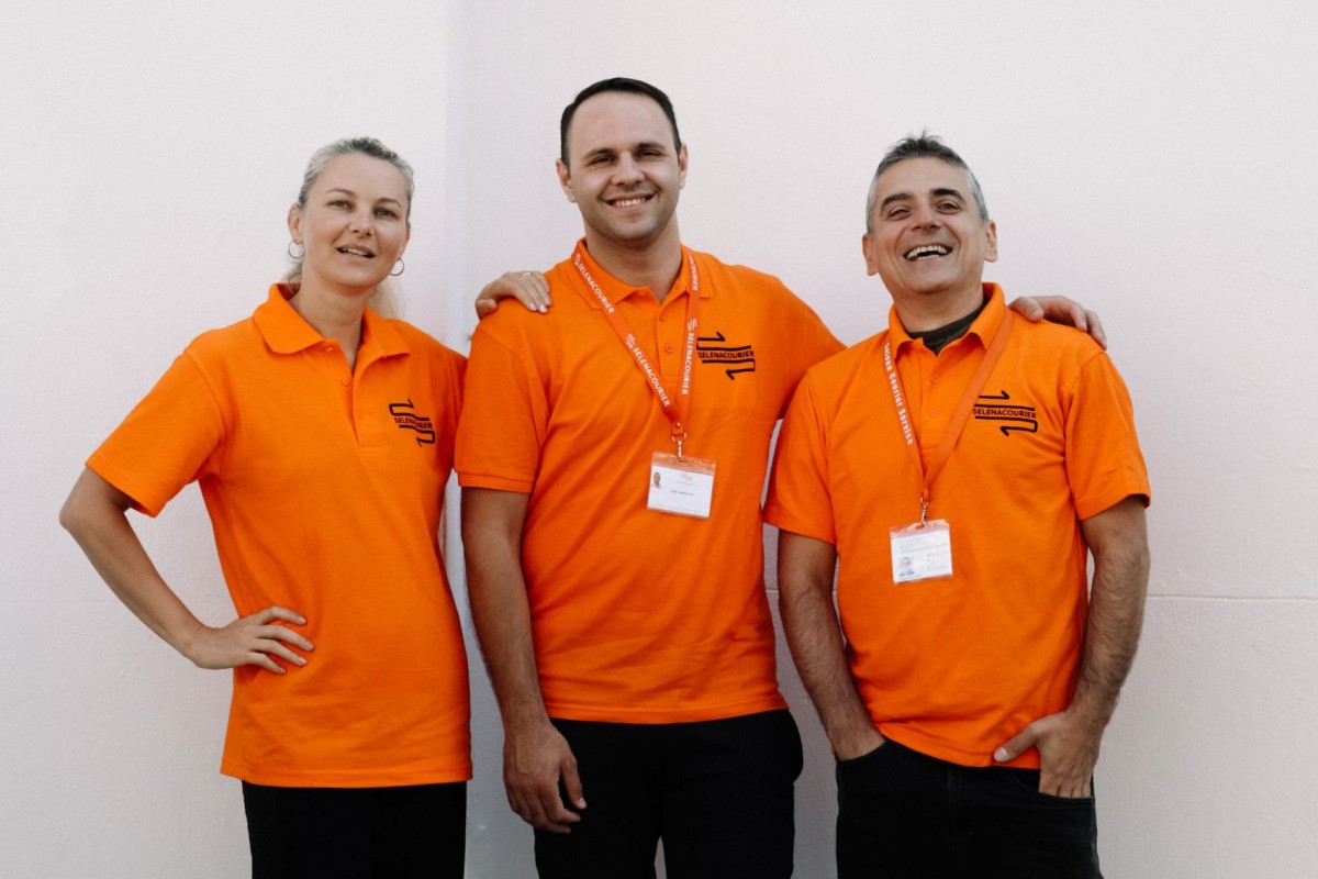 Selena Courier team of couriers in branded uniform